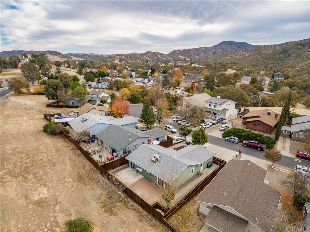 4913 Sparrow Hawk Lane Paso Robles, CA 93446 - Photo 11 of 37 Side view showing the RV parking area on the side of the garage.