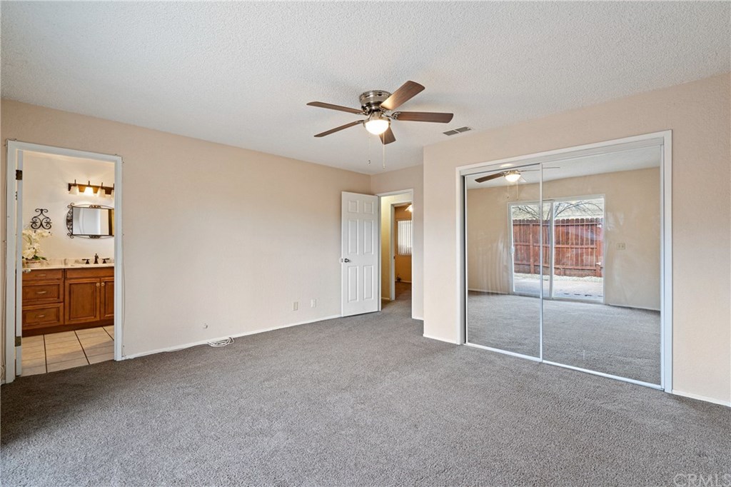 4913 Sparrow Hawk Lane Paso Robles, CA 93446 - Photo 29 of 37 Master bedroom with large wardrobe closet