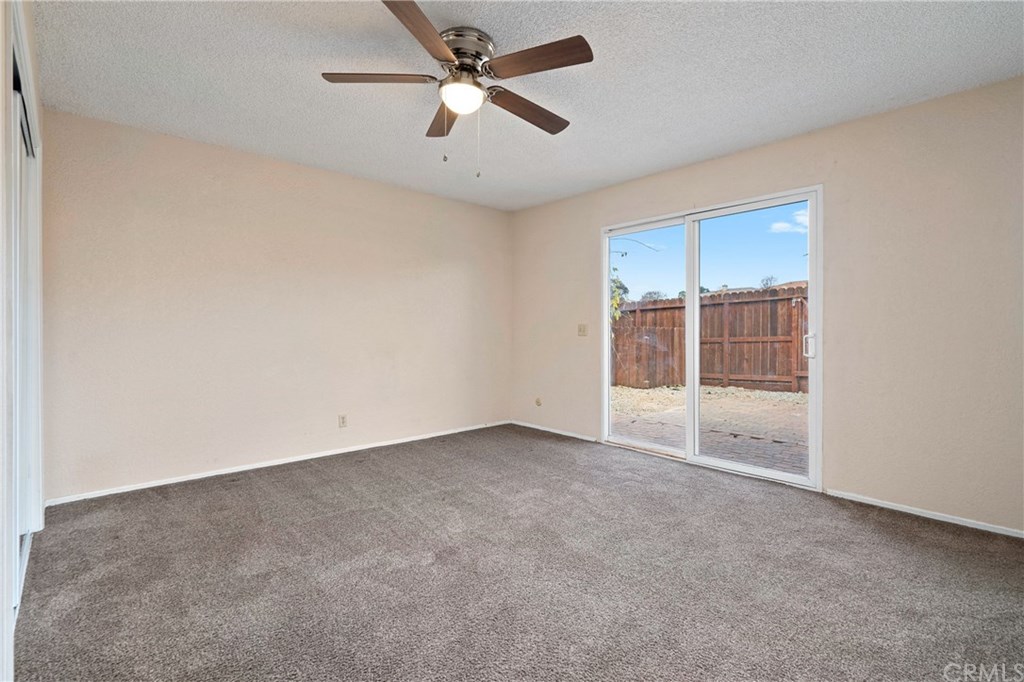 4913 Sparrow Hawk Lane Paso Robles, CA 93446 - Photo 30 of 37 Master bedroom has slider access to the patio area.