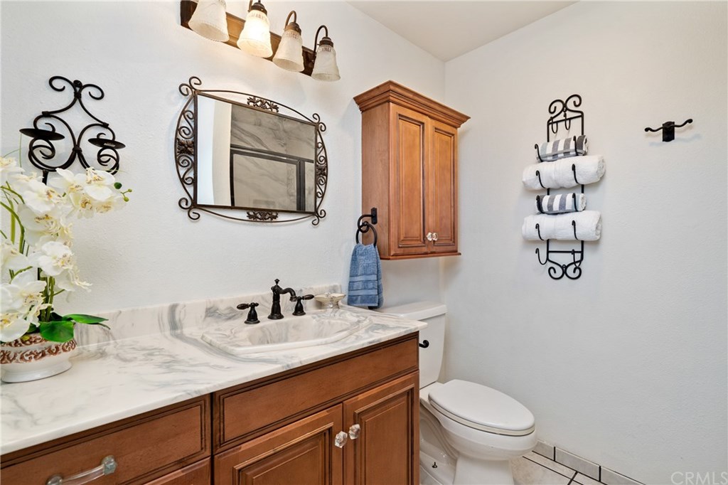 4913 Sparrow Hawk Lane Paso Robles, CA 93446 - Photo 31 of 37 Master bathroom has a nice vanity, large stall shower and tile flooring.