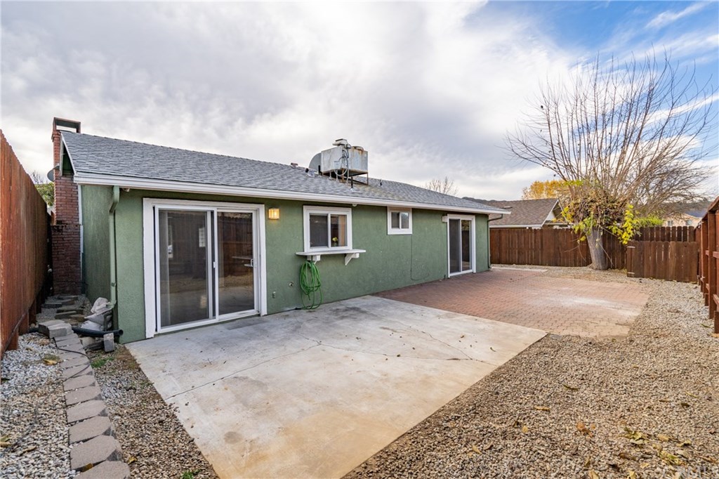 4913 Sparrow Hawk Lane Paso Robles, CA 93446 - Photo 32 of 37 The back of the house with patios and back yard.