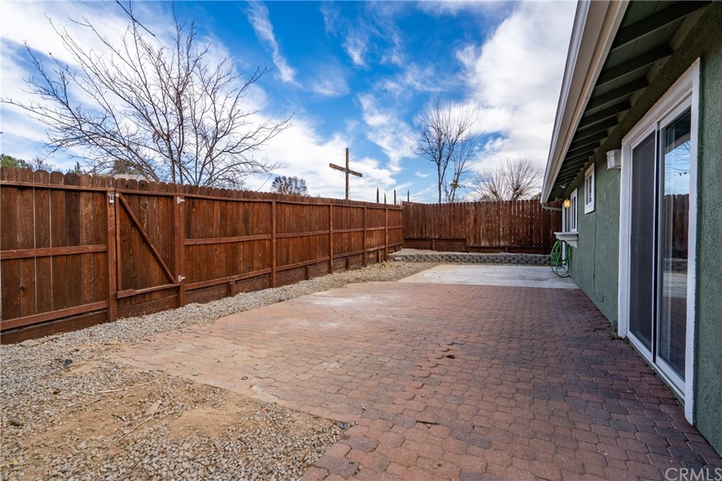 4913 Sparrow Hawk Lane Paso Robles, CA 93446 - Photo 36 of 37 Patio area and new fencing with gate to greenbelt