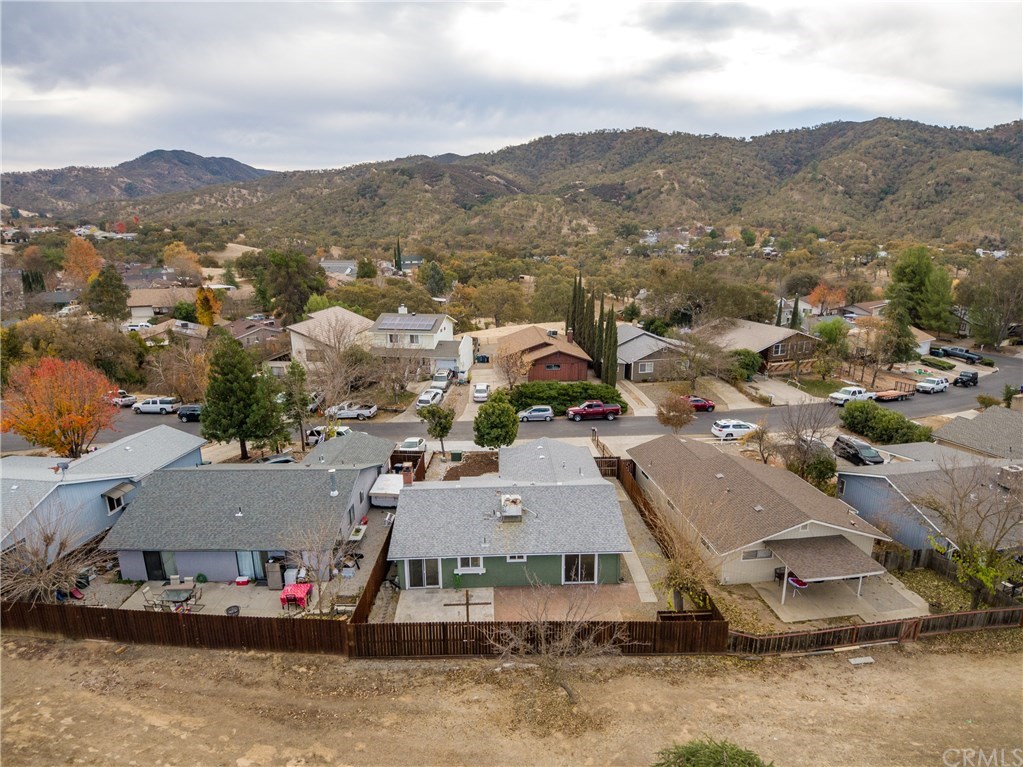 4913 Sparrow Hawk Lane Paso Robles, CA 93446 - Photo 9 of 37 The yard is fully fenced with new fencing.