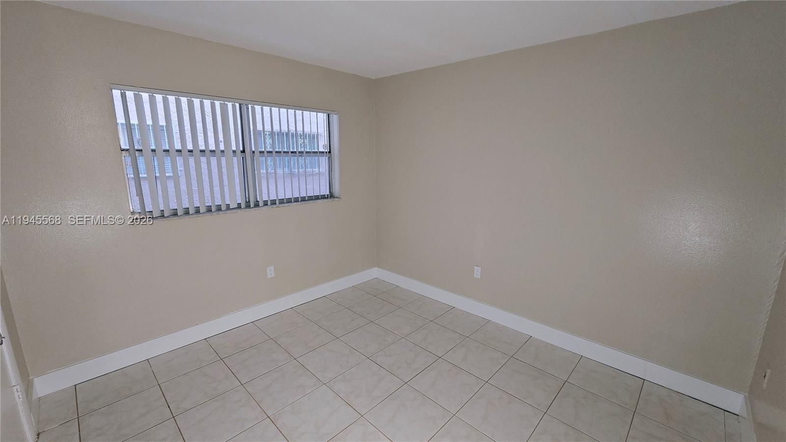 19791 Southwest 114th Avenue, Unit 131 Miami, FL 33157 - Photo 11 of 12 an empty room with windows