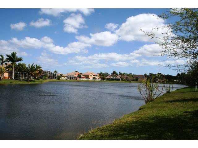 2183 Southwest Panther Trace Stuart, FL 34997 - Photo 25 of 25 a view of outdoor space and lake