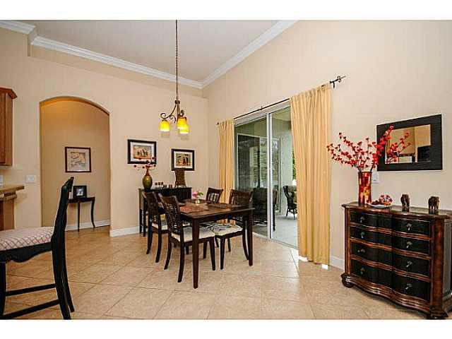 2183 Southwest Panther Trace Stuart, FL 34997 - Photo 5 of 25 a dining room with furniture and window