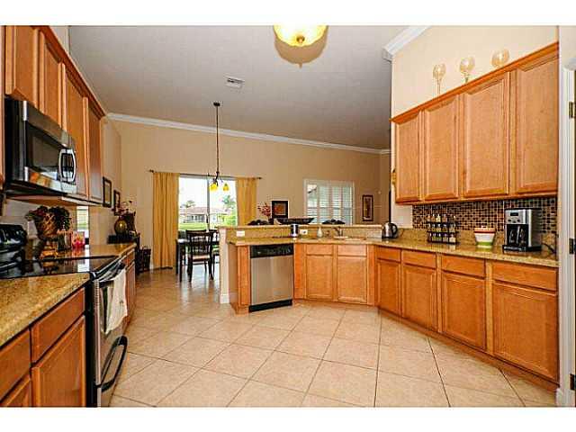 2183 Southwest Panther Trace Stuart, FL 34997 - Photo 8 of 25 a kitchen with lots of counter top space