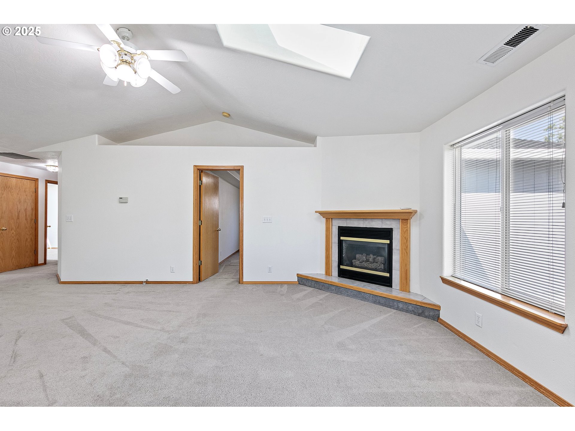 4018 Forsythia Street Springfield, OR 97478 - Photo 17 of 39 a view of livingroom with fireplace