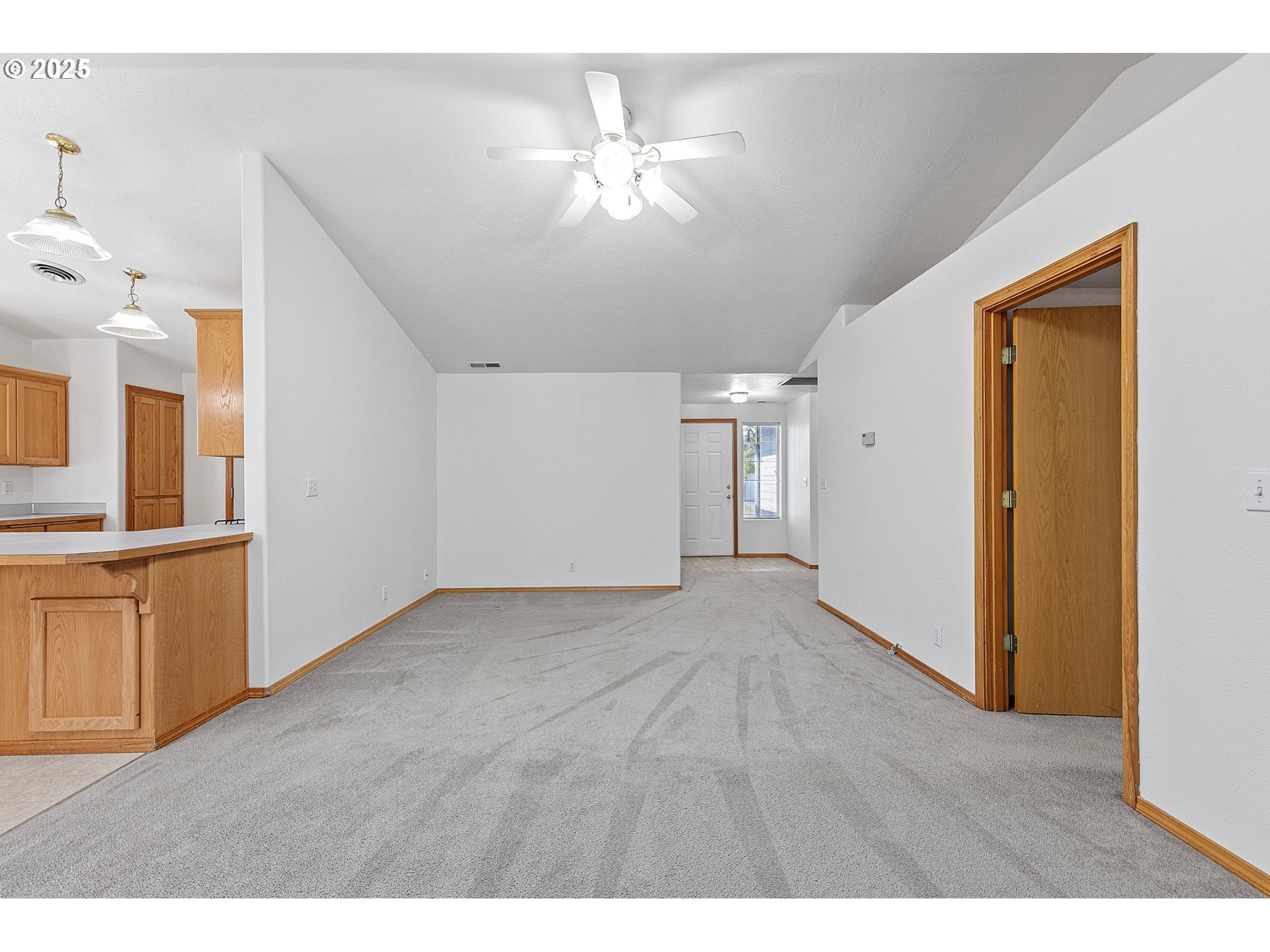 4018 Forsythia Street Springfield, OR 97478 - Photo 18 of 39 a view of an empty room with window and cabinet