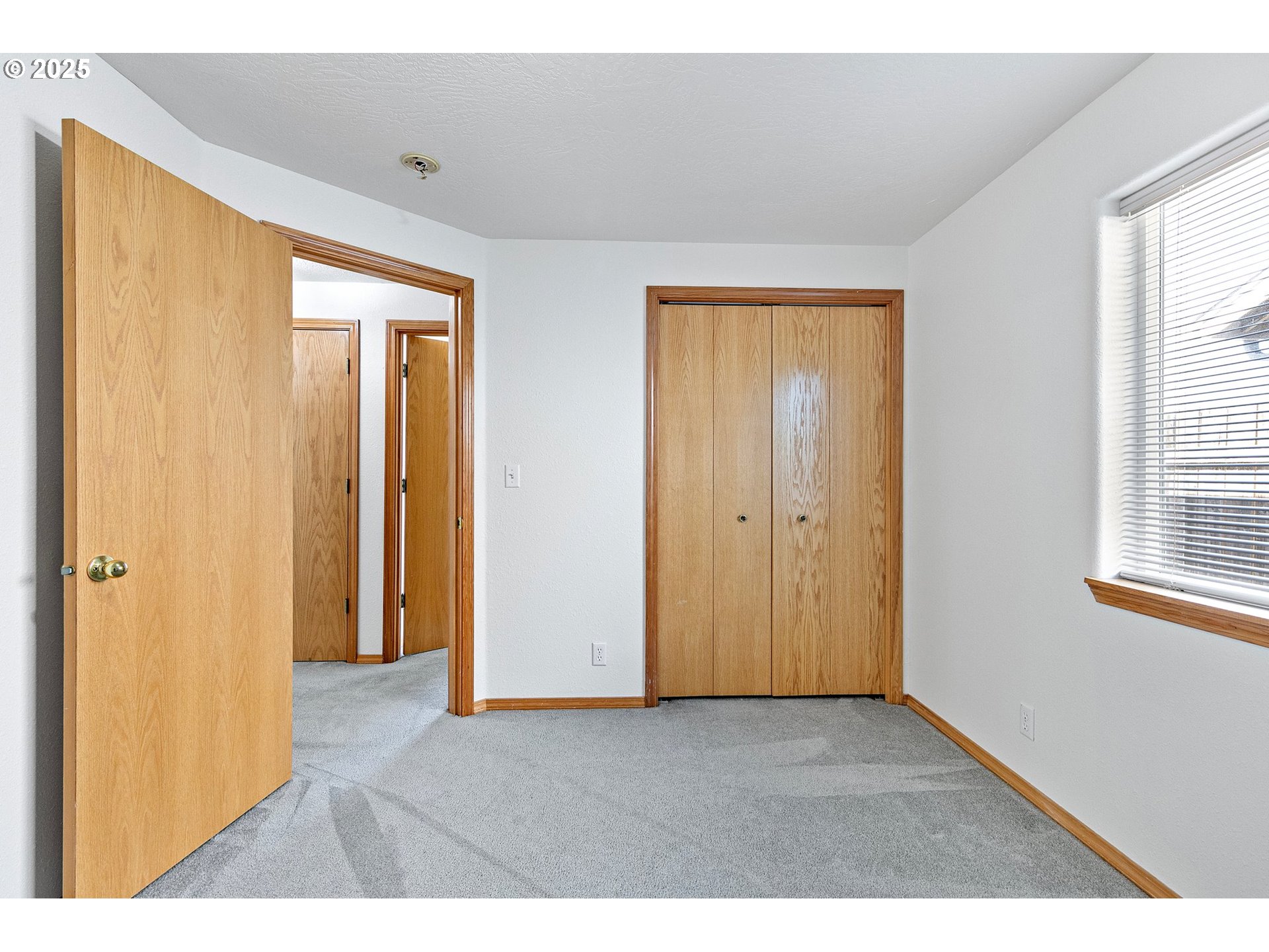 4018 Forsythia Street Springfield, OR 97478 - Photo 28 of 39 a view of an empty room with a window
