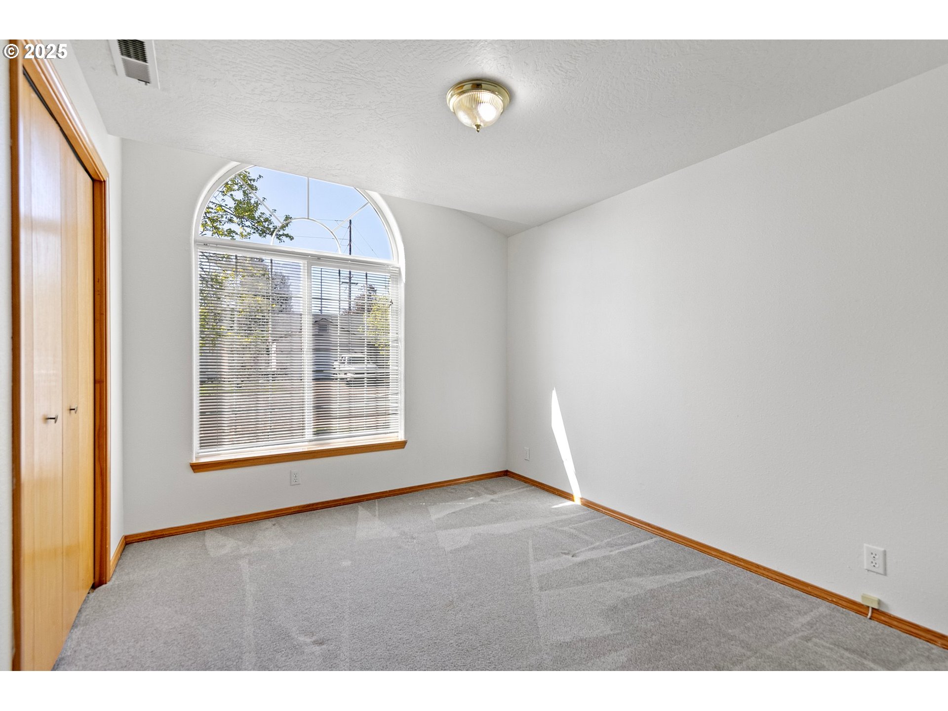 4018 Forsythia Street Springfield, OR 97478 - Photo 29 of 39 a view of an empty room with a window