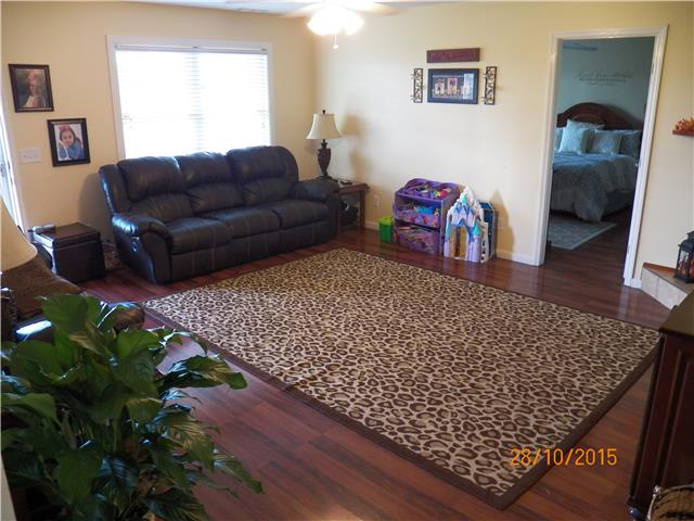 7680 East Gum Road Murfreesboro, TN 37127 - Photo 5 of 14 Here's another view of the family room; taken from the kitchen. The door you see on the right leads to the Master Bedroom.