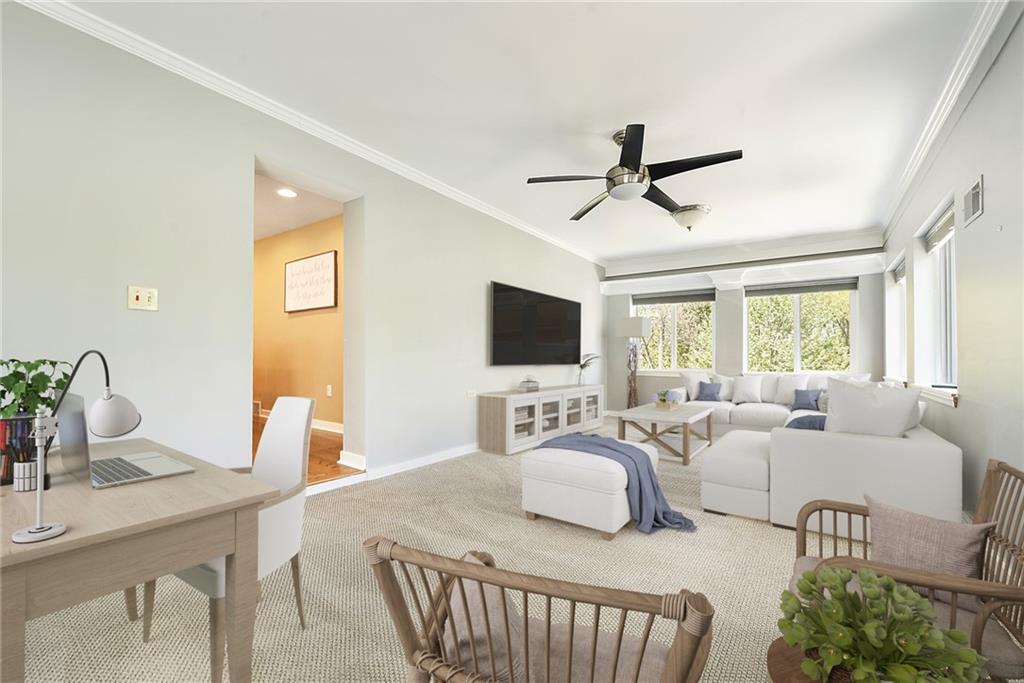 719 Pinetree Road Pittsburgh, PA 15243 - Photo 14 of 35 a living room with furniture a flat screen tv and a large window
