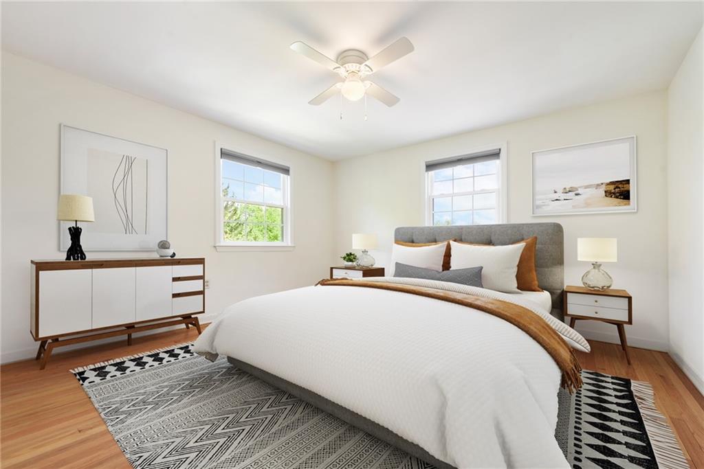 719 Pinetree Road Pittsburgh, PA 15243 - Photo 21 of 35 a bedroom with a large bed and a window