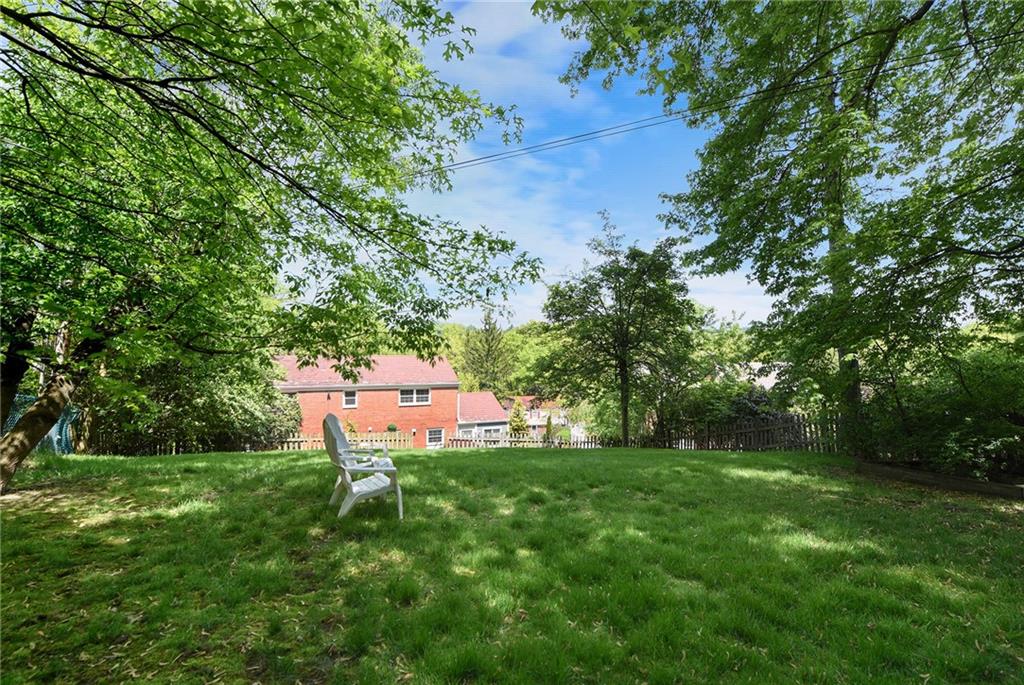 719 Pinetree Road Pittsburgh, PA 15243 - Photo 33 of 35 a view of a backyard with a small park