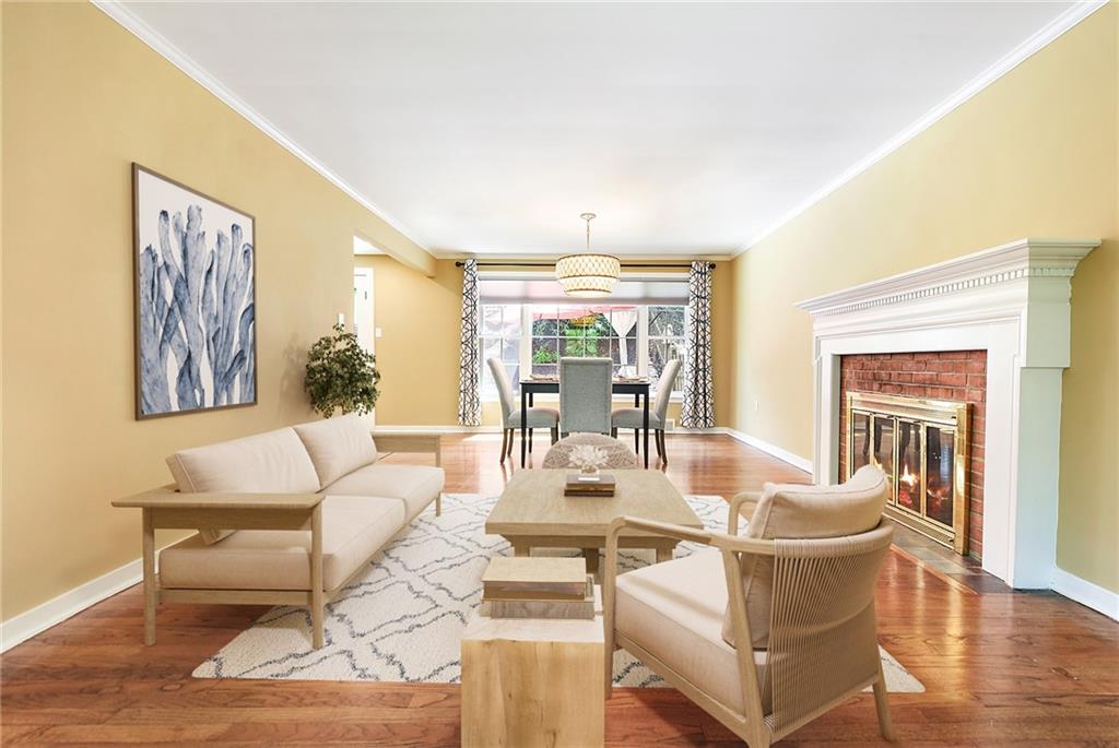 719 Pinetree Road Pittsburgh, PA 15243 - Photo 4 of 35 a view of a dining room with furniture a chandelier and wooden floor