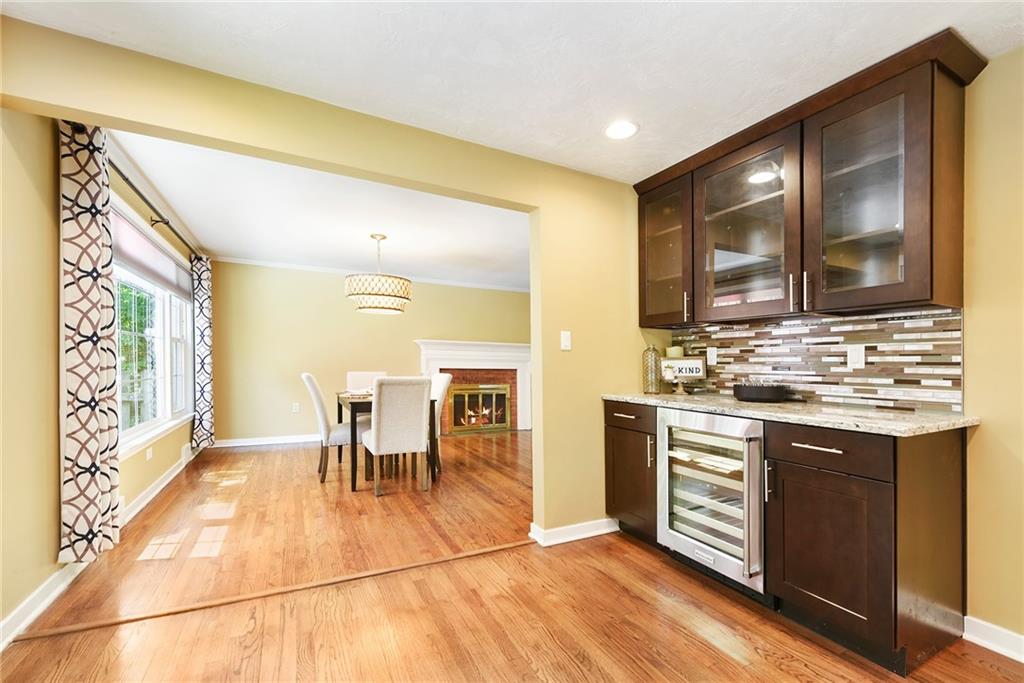 719 Pinetree Road Pittsburgh, PA 15243 - Photo 6 of 35 a kitchen with stainless steel appliances granite countertop a sink and cabinets