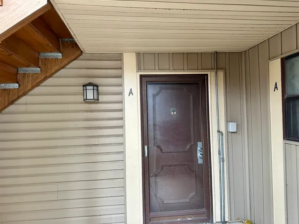 a view of front door and porch