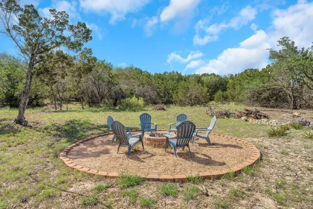 a view of balcony and yard
