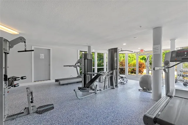 a view of a room with gym equipment