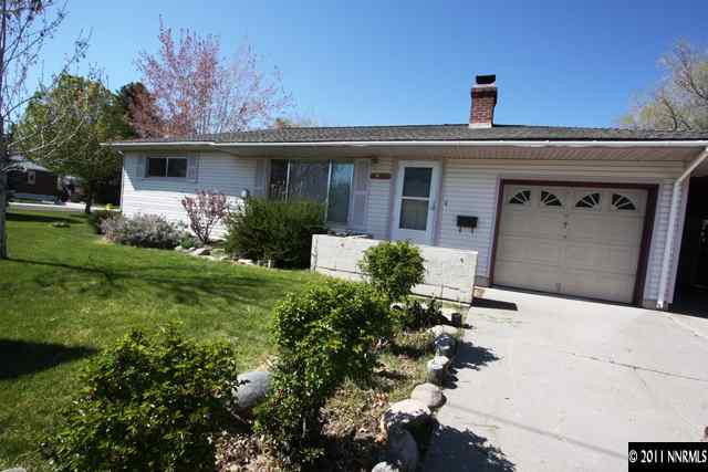 1425 Allen Street Reno, NV 89509 - Photo 1 of 13 a front view of a house with garden