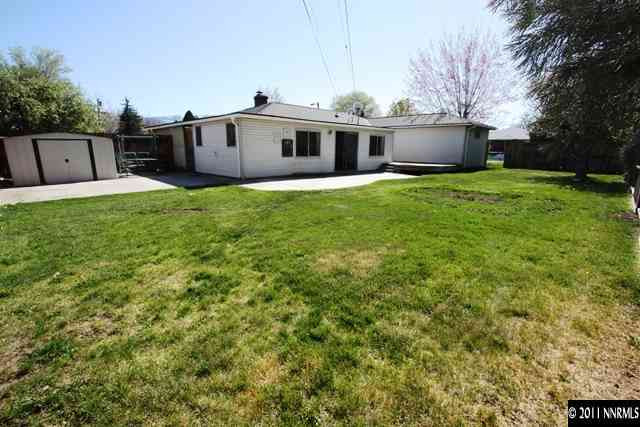 1425 Allen Street Reno, NV 89509 - Photo 12 of 13 a view of a house with a yard and sitting area