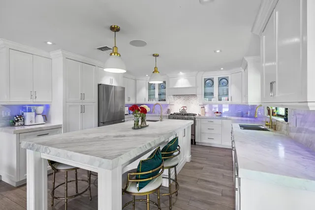a bedroom with bed and flat tv screen