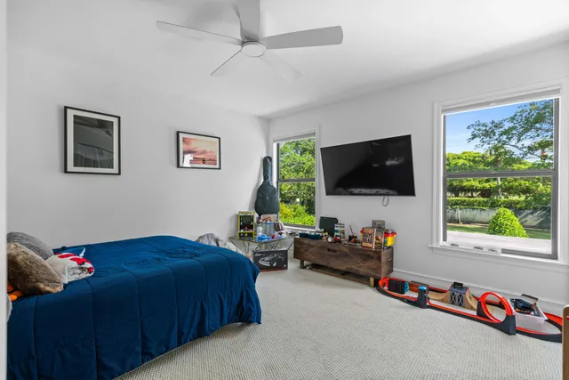 a house with palm tree in front of it