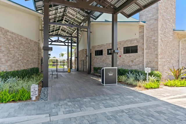 a view of a park with large trees