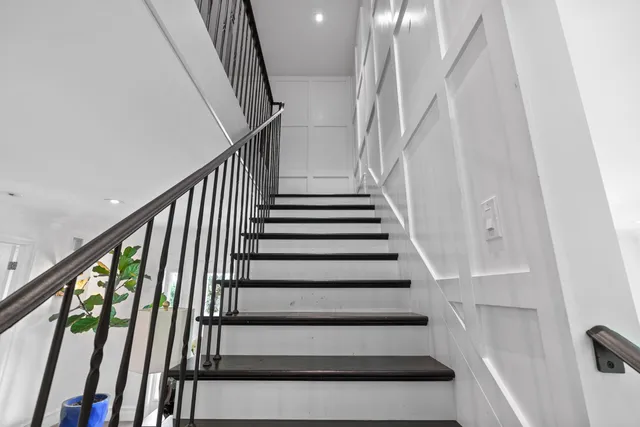 a living room with furniture or couch and a wooden floor