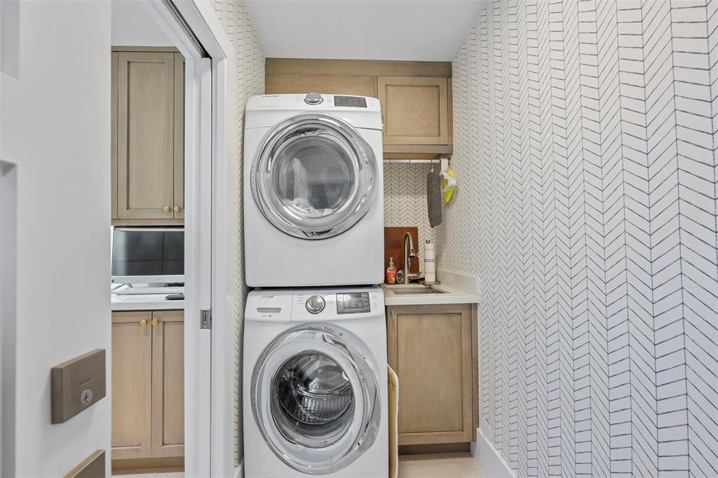 2330 Northeast 35th Street Lighthouse Point, FL 33064 - Photo 17 of 71 a utility room with dryer and washer