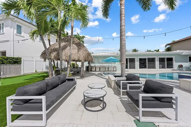 a view of a room with air conditioner duct and materials on floor