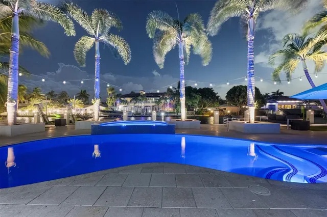 a view of a patio with swimming pool