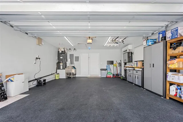 a view of swimming pool with outdoor seating