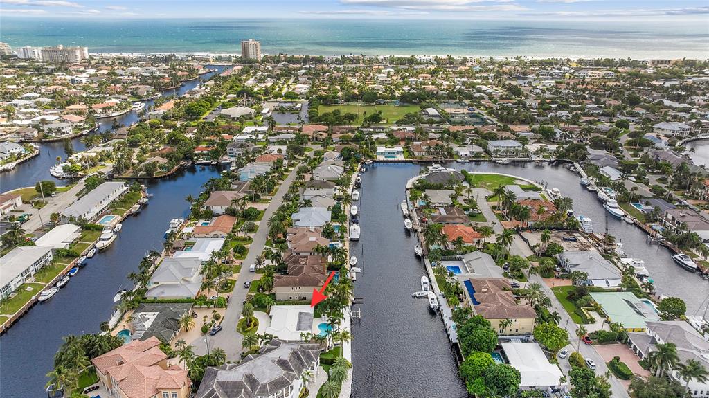2330 Northeast 35th Street Lighthouse Point, FL 33064 - Photo 68 of 71 an aerial view of residential houses with outdoor space