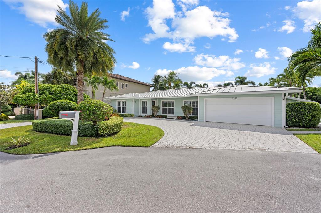 2330 Northeast 35th Street Lighthouse Point, FL 33064 - Photo 69 of 71 a house with outdoor space