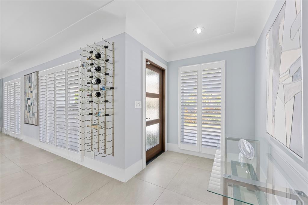 2330 Northeast 35th Street Lighthouse Point, FL 33064 - Photo 7 of 71 a view of an empty room with a window
