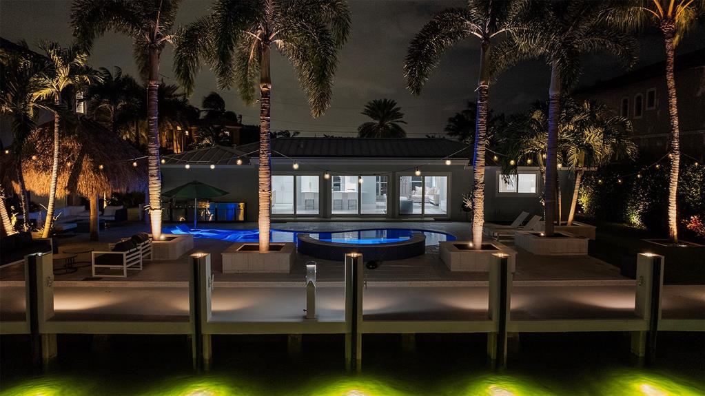 2330 Northeast 35th Street Lighthouse Point, FL 33064 - Photo 71 of 71 a view of swimming pool with outdoor seating