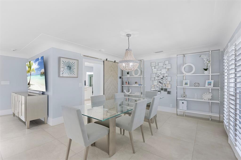 2330 Northeast 35th Street Lighthouse Point, FL 33064 - Photo 10 of 71 a view of a dining room with furniture