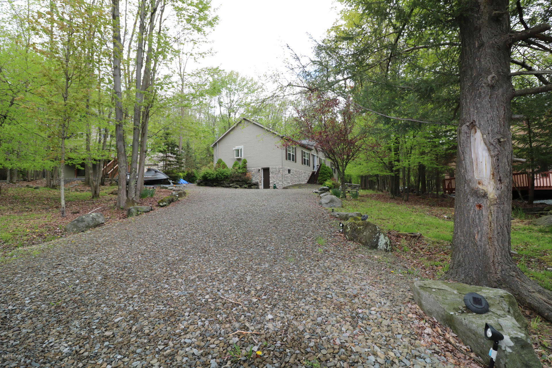 1271 Brookfield Road Lake Ariel, PA 18436 - Photo 9 of 143 a view of a house with a backyard and tree