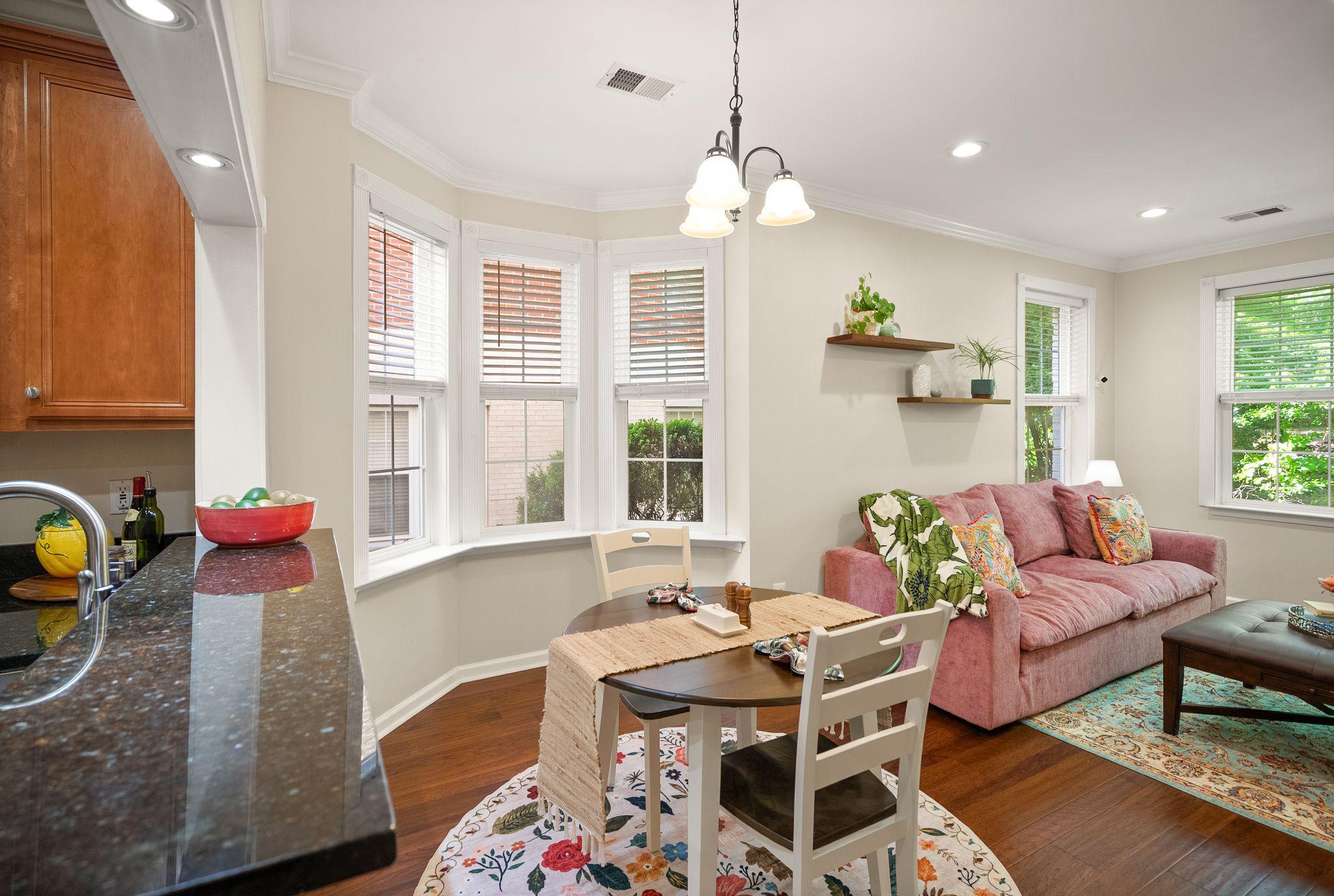 12414 A Liberty Bridge Road Fairfax, VA 22033 - Photo 8 of 38 a living room with furniture and a table