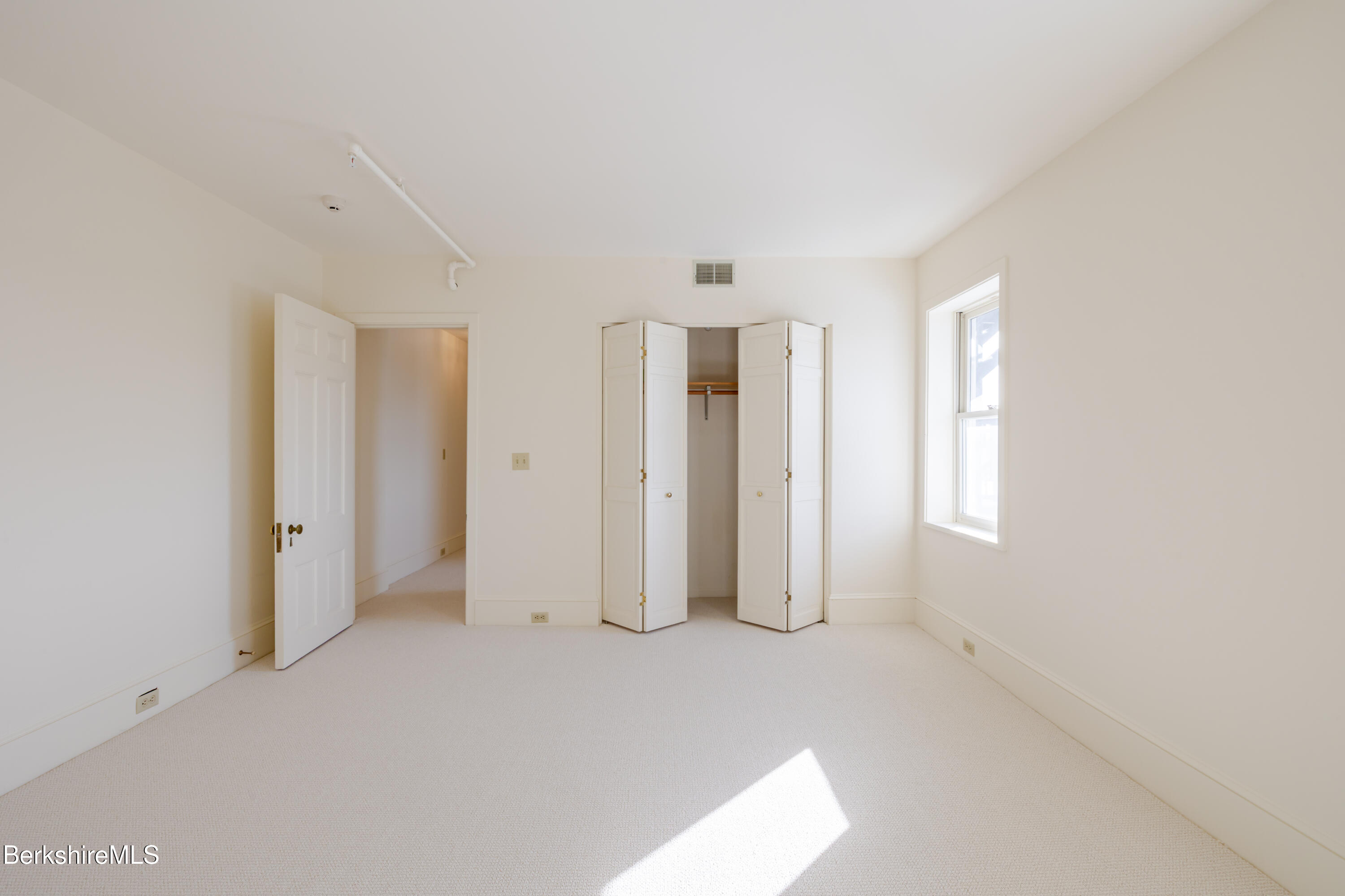 200 Vanna # 3 Old Stockbridge Road Stockbridge, MA 01262 - Photo 25 of 29 an empty room with windows