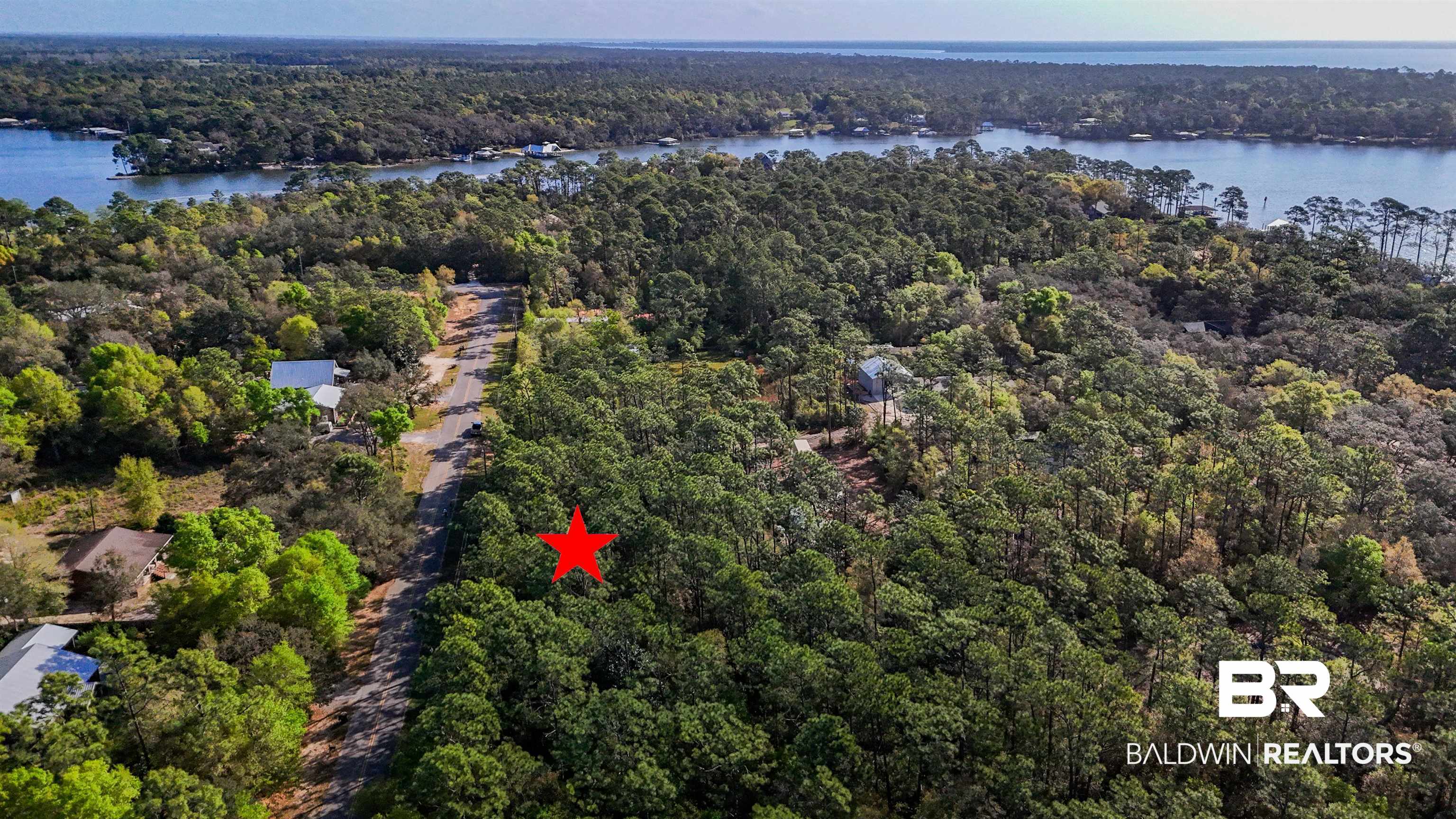 0 Cypress Street Elberta, AL 36530 - Photo 5 of 7 Drone / aerial view of a forest and a large body of water