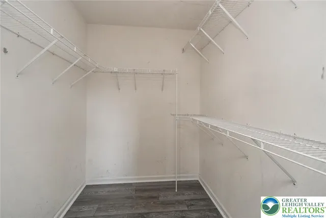 a view of a room with racks on the wall