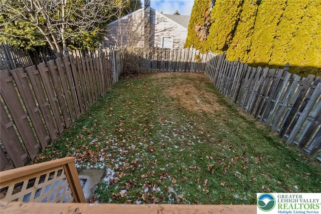 a view of stairs and wooden fence
