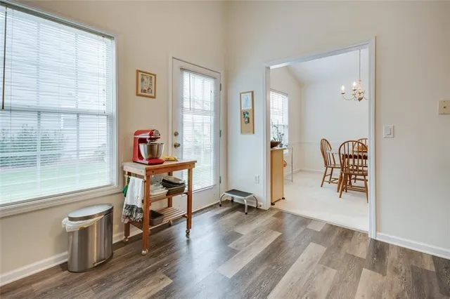 a kitchen with stainless steel appliances a refrigerator and a stove