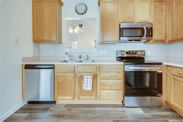 a spacious bedroom with a bed and a window
