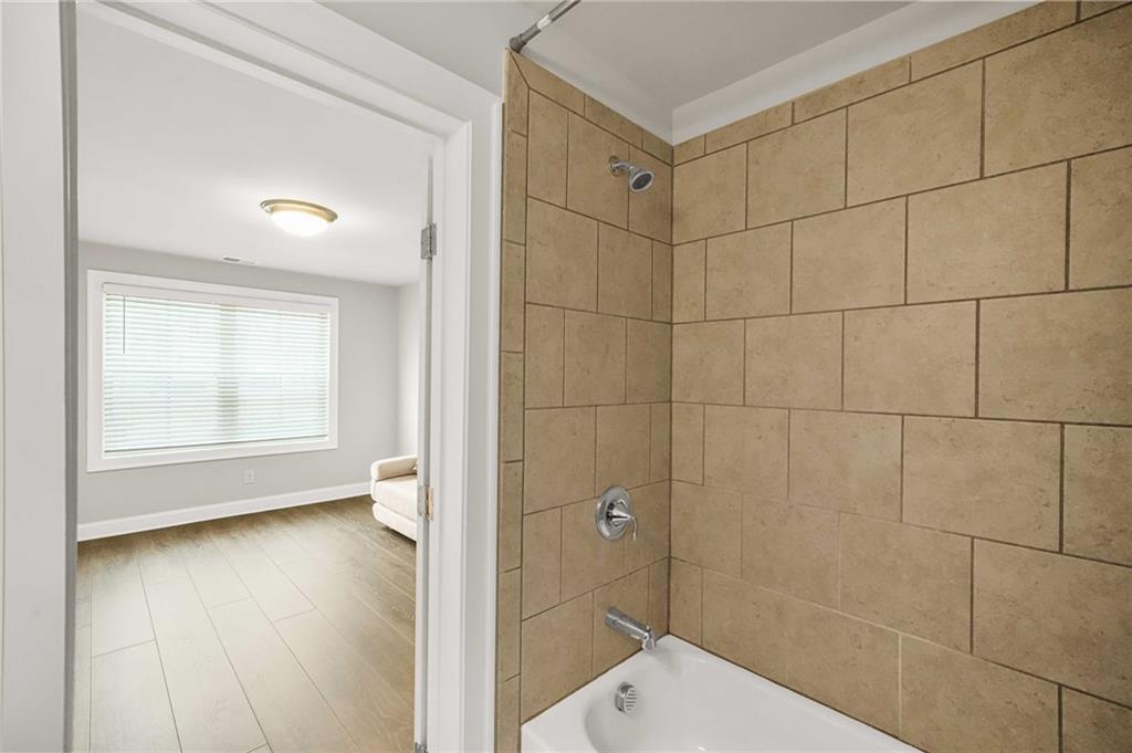 2207 Parkside Gln View Duluth, GA 30097 - Photo 28 of 41 a bathroom with a shower