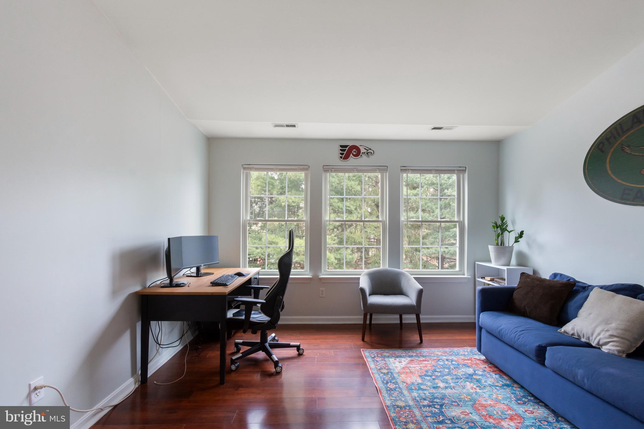 2406 Ellsworth Way, Unit 3B Frederick, MD 21702 - Photo 18 of 27 Large bedroom #2 with a lot of light