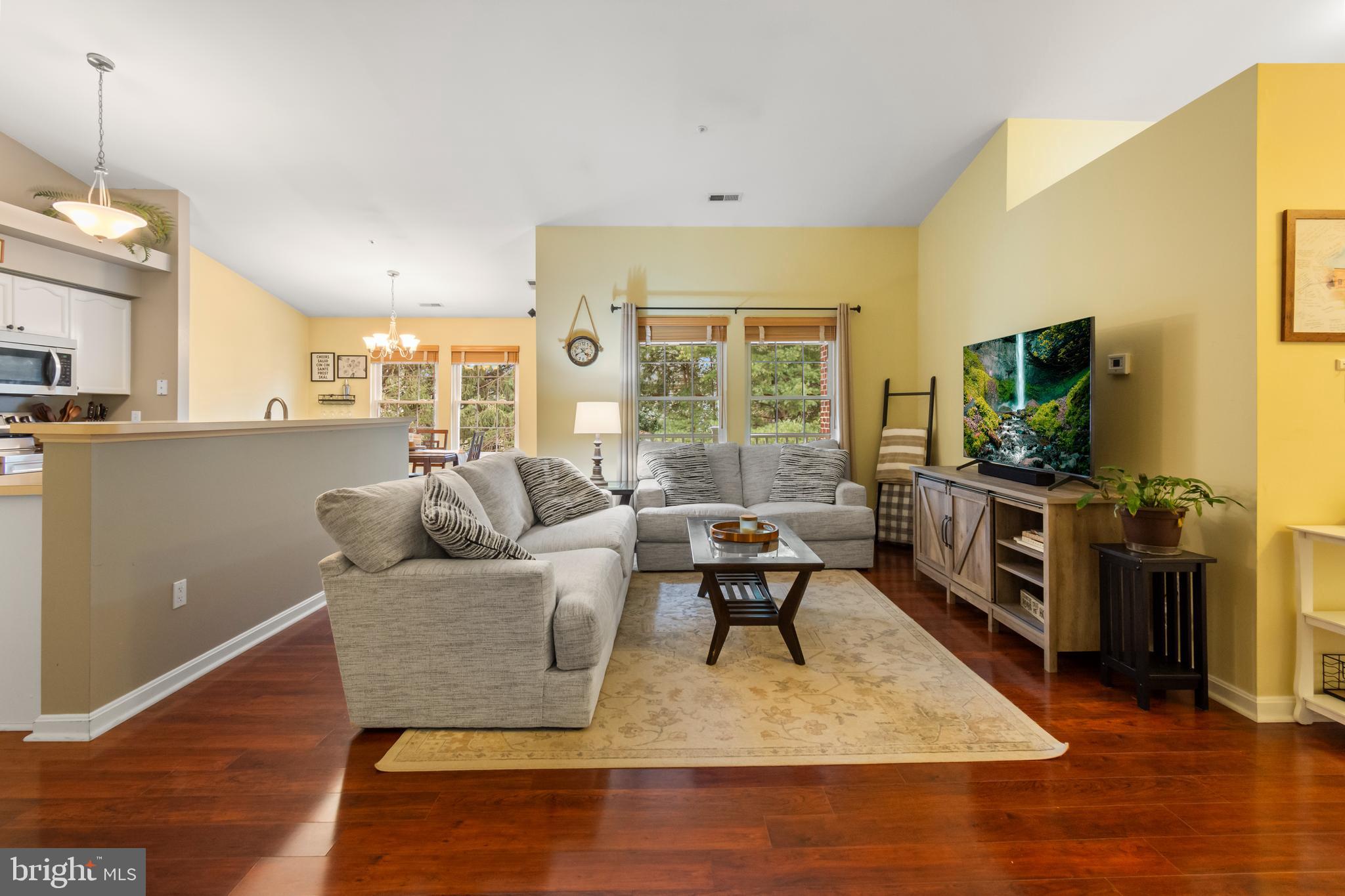 2406 Ellsworth Way, Unit 3B Frederick, MD 21702 - Photo 3 of 27 Large family room with gorgeous floors